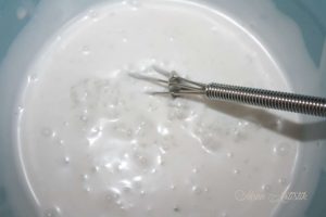 Masque "Divine perle de riz", au cacao et à la crème de coco, pour des cheveux lissés, fortifiés et brillants.