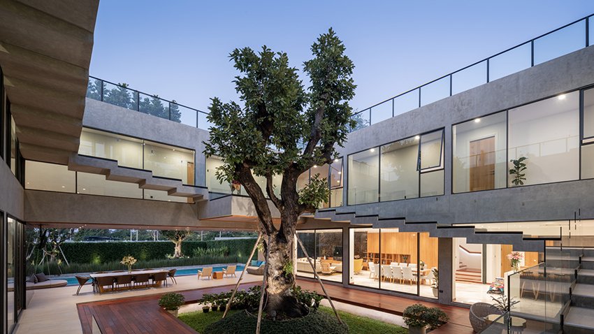 un studio à grande échelle construit la «villa 168» de jongluck pour connecter trois familles en Thaïlande designboom