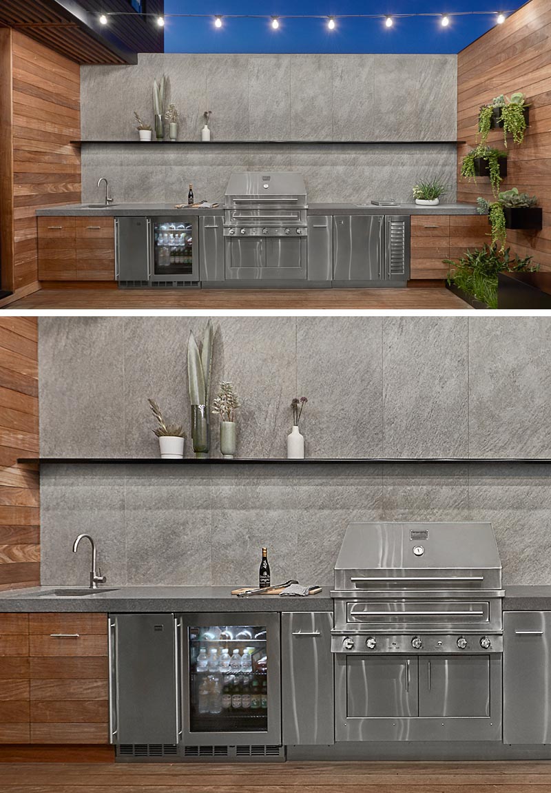 Cette cuisine extérieure moderne mur à mur comprend des armoires en acier inoxydable et des armoires en bois personnalisées conçues par dSPACE avec des panneaux en bois Ipe et un cadre de support en acier inoxydable dissimulé. #OutdoorKitchen #St StainlessSteelKitchen