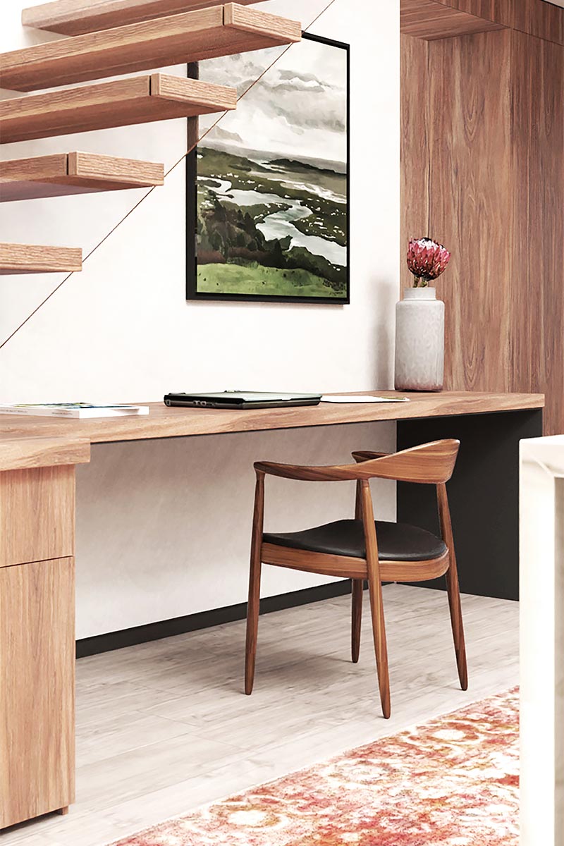Au lieu d'avoir un espace vide inutilisé sous ces escaliers modernes, les concepteurs ont combiné les escaliers, le bureau et le stockage tous ensemble, créant un espace cohérent et utile. #StairDesign #HomeOffice #BuiltInDesk #ModernStairs
