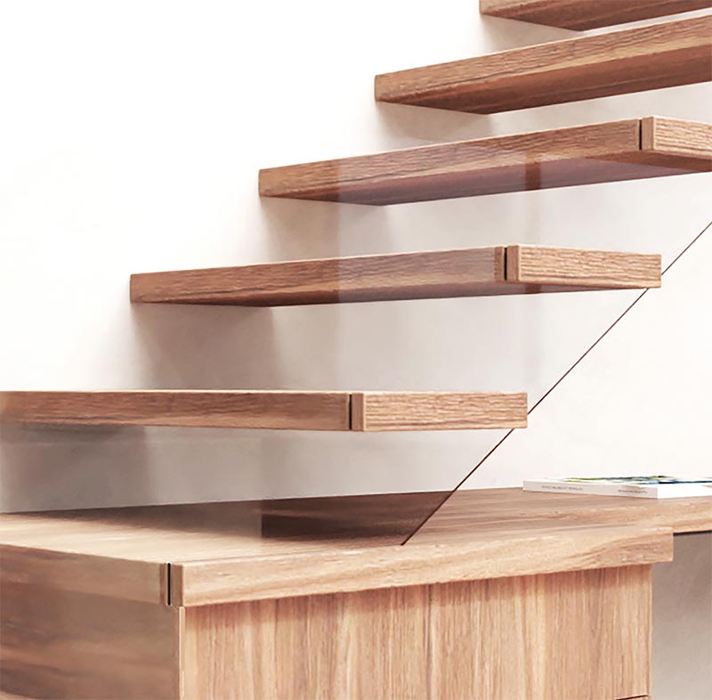 Voici un examen plus approfondi qui montre comment la rampe de sécurité en verre a été intégrée dans la conception de ces escaliers en bois modernes. En attachant le verre au bout des marches de l'escalier, ils peuvent le faire suivre la forme de l'escalier qui le fait presque disparaître, créant ainsi un sentiment d'escalier flottant. #ModernWoodStairs #GlassSafetyRailing #StairDesign