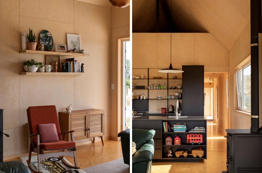 Séjour avec chaise rouge et armoires de cuisine noires