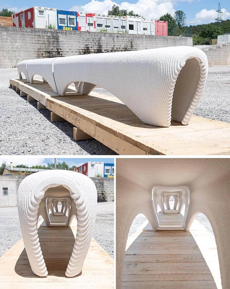 Un banc d'extérieur en béton blanc imprimé en 3D.