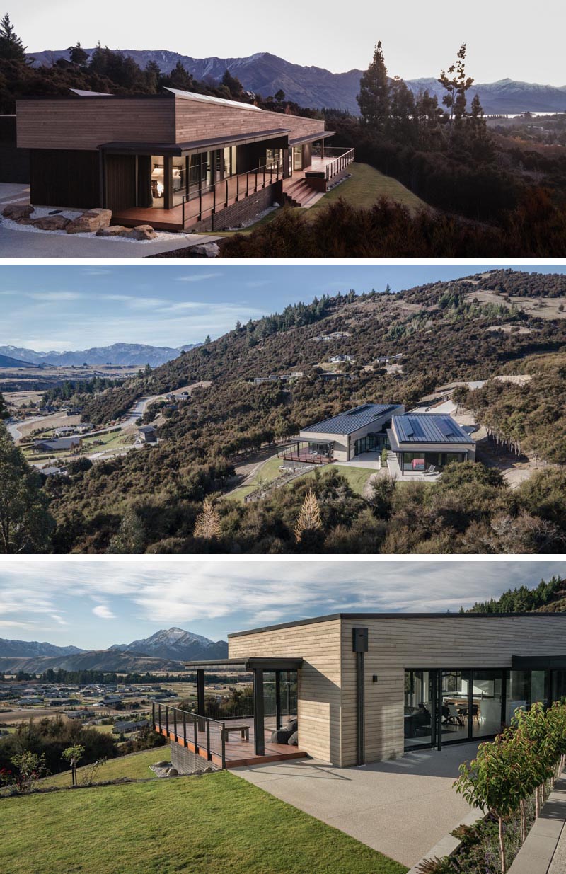 Cette maison moderne a deux formes en forme de coin qui sont reliées par une passerelle en verre.