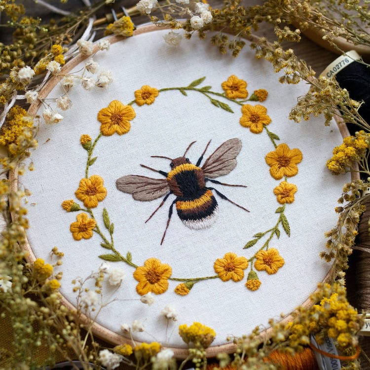 Broderie à l'aiguille par Emillie Ferris