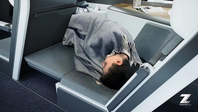 Passager allongé et dormant en vol