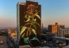 Une fleur sauvage monumentale de 20 étages s’épanouit au-dessus de Jersey City dans une nouvelle peinture murale de l’artiste Mona Caron