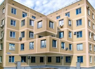 Une murale en trompe-l’œil de Shozy imagine un ajout architectural en 3D à un immeuble d’appartements